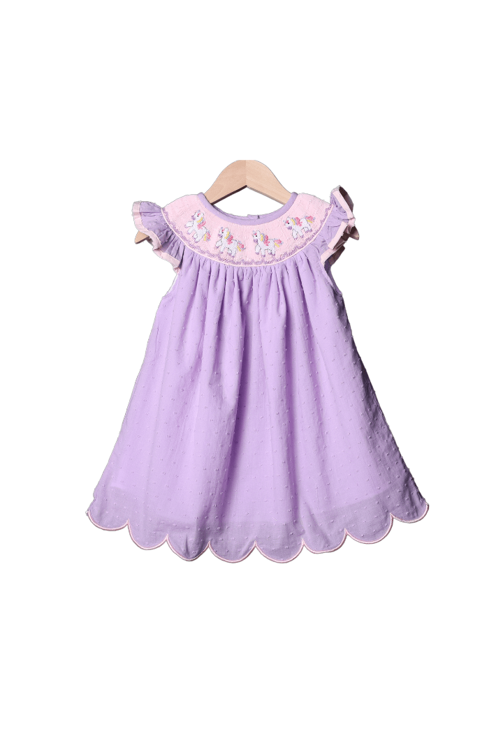 The Smocked Flamingo Apparel & Accessories Smocked Unicorn Lavender Swiss Dot Bishop Dress