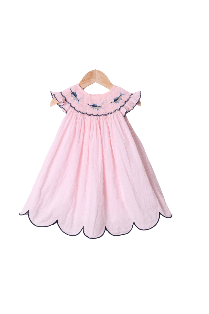 The Smocked Flamingo Smocked Swordfish Pink Swiss Dot Dress