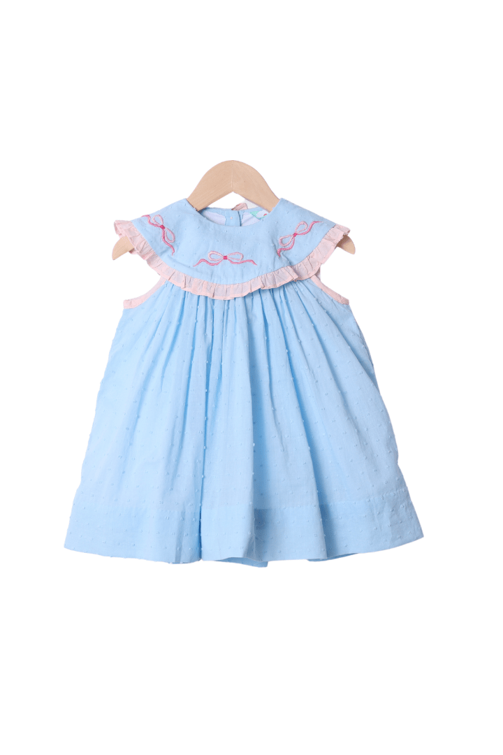 The Smocked Flamingo Sweet Embroidered Bow Blue and Pink Swiss Dot Dress