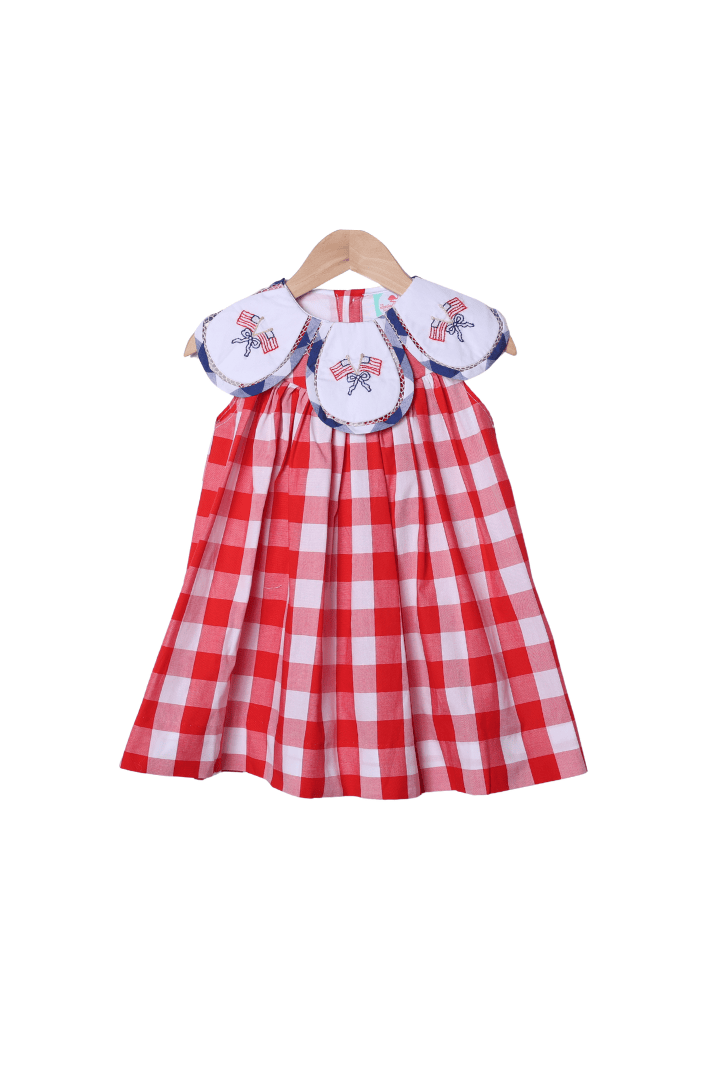 The Smocked Flamingo Apparel & Accessories Hand Embroidered American Flag Red Buffalo Check Tulip Dress