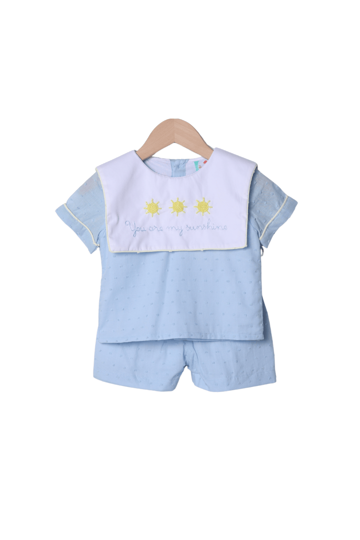The Smocked Flamingo Apparel & Accessories French Knot You Are My Sunshine Blue Swiss Dot Bib Short Set