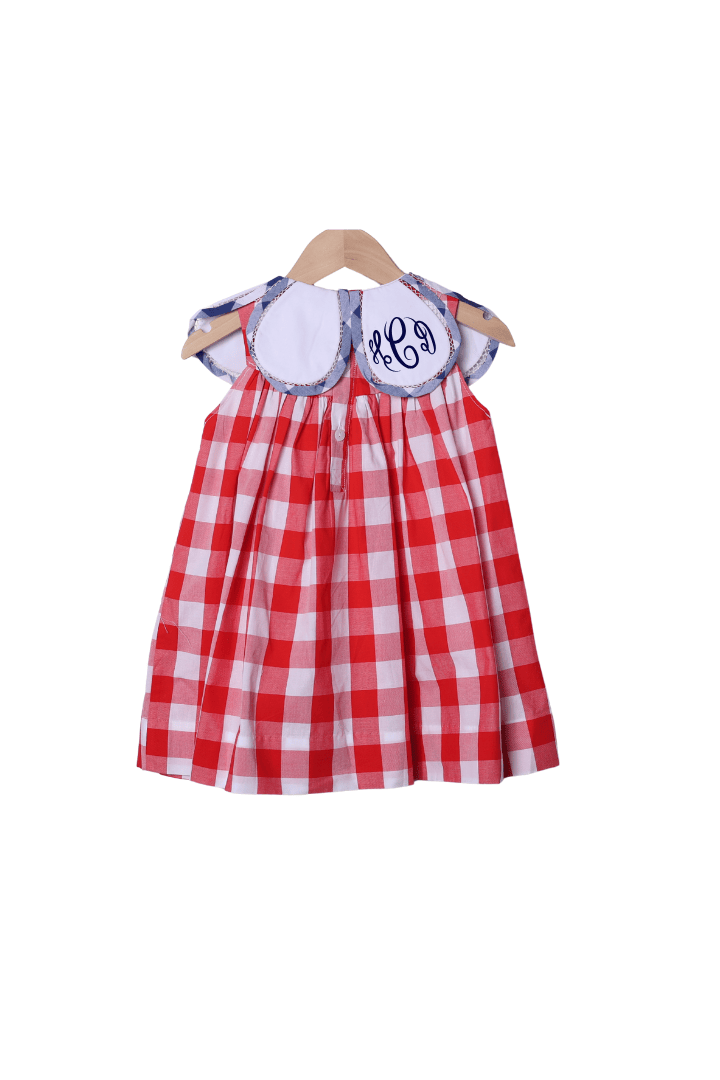 The Smocked Flamingo Apparel & Accessories Hand Embroidered American Flag Red Buffalo Check Tulip Dress