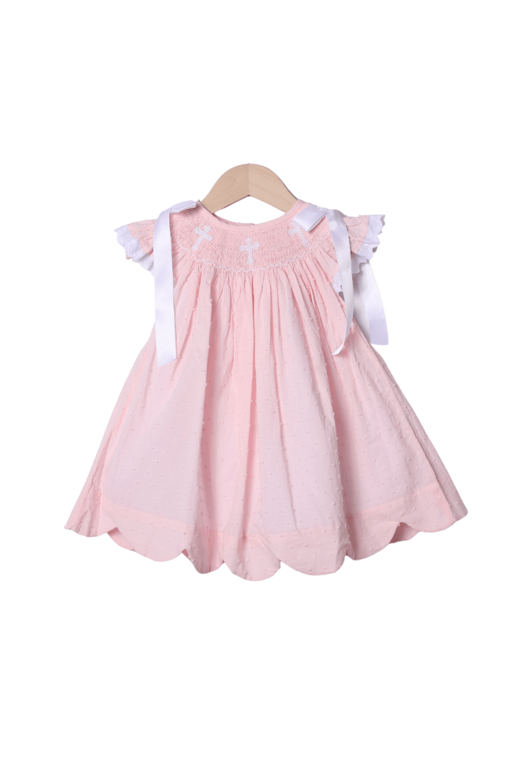 The Smocked Flamingo Apparel & Accessories Smocked Cross Pink Swiss Dot Bow Dress
