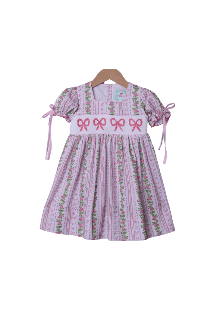The Smocked Flamingo Apparel & Accessories Smocked Fancy Floral Bow Pique Dress
