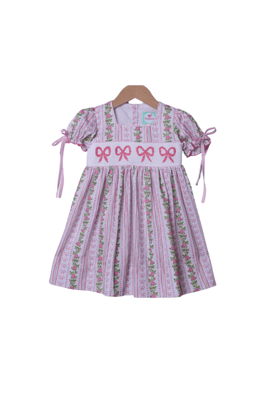 The Smocked Flamingo Apparel & Accessories Smocked Fancy Floral Bow Pique Dress
