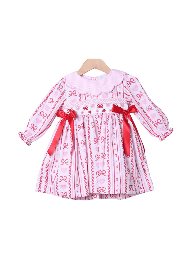The Smocked Flamingo Apparel & Accessories Smocked Fancy Valentine Bow Dress