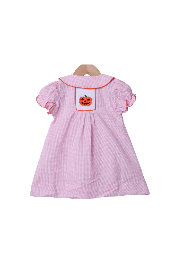 The Smocked Flamingo Apparel & Accessories Smocked Jack O Lantern Pink Seersucker Dress