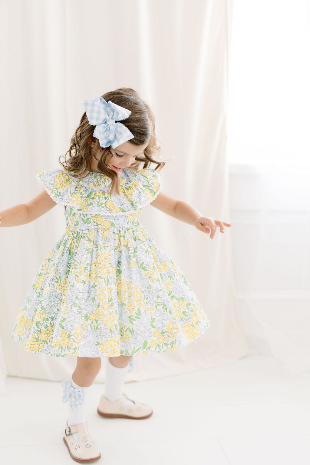 The Smocked Flamingo Apparel & Accessories Yellow and Blue Floral Ruffle Dress