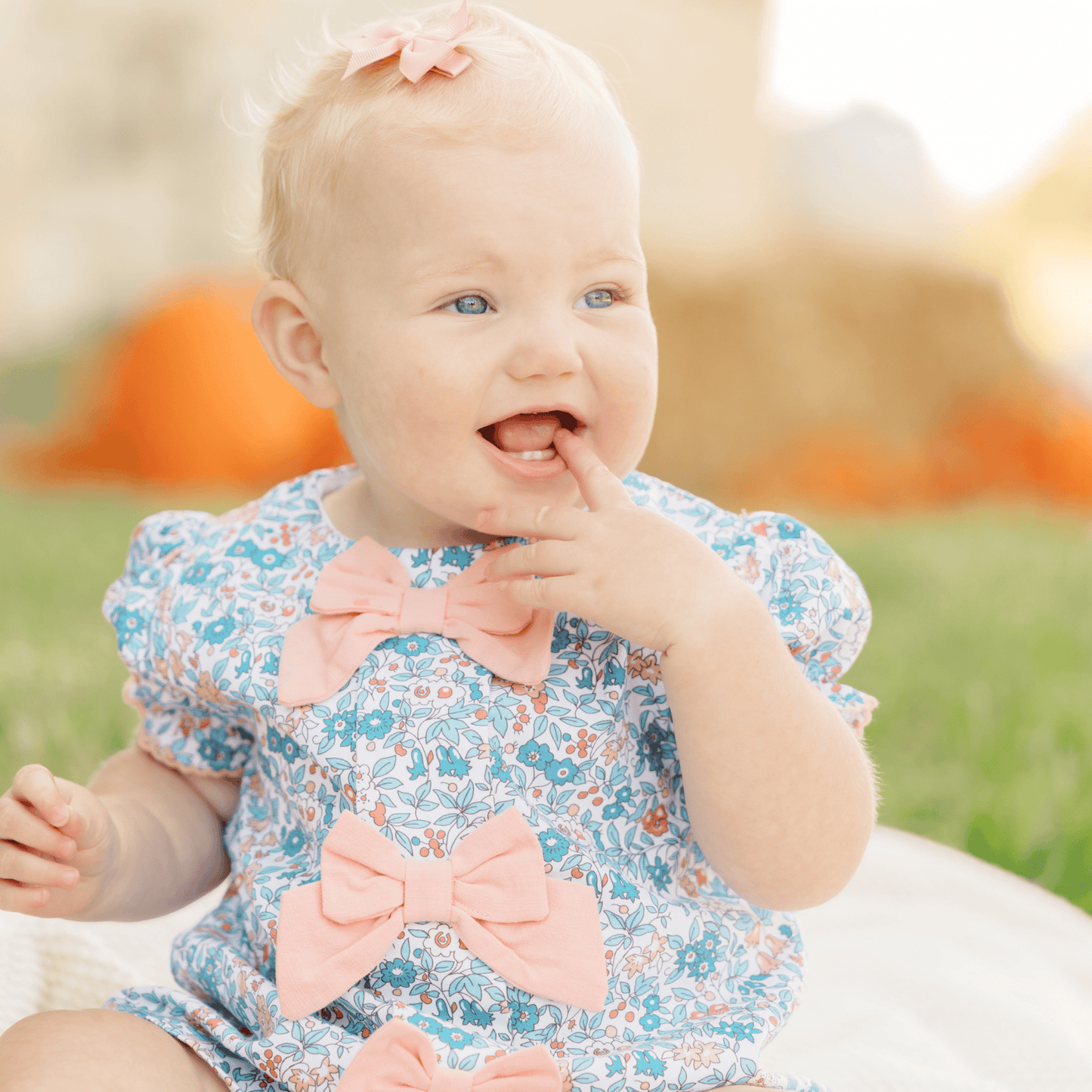 The Smocked Flamingo Children's Clothing Apricot and Blue Fall Floral Bow Bubble