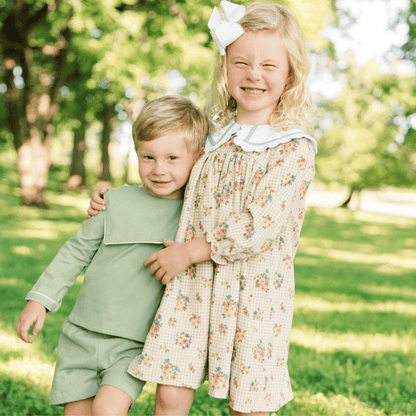 The Smocked Flamingo Children's Clothing Olive Green Linen Bib Long Sleeve Short Set