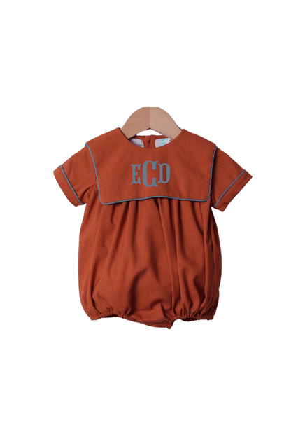 The Smocked Flamingo Pre-Order Rust Linen Short Sleeve Bib Bubble