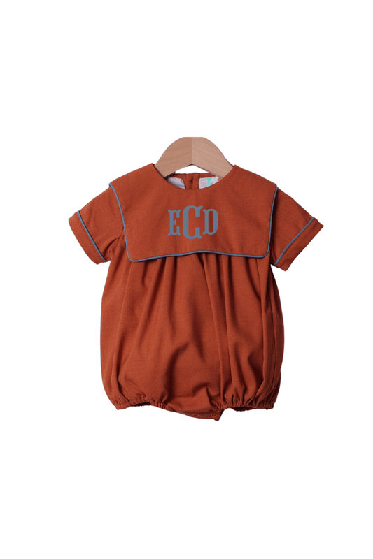 The Smocked Flamingo Pre-Order Rust Linen Short Sleeve Bib Bubble