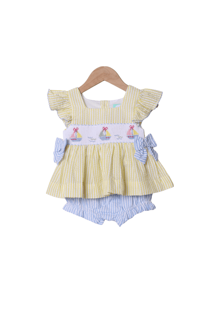 The Smocked Flamingo Smocked Sailboat Blue/Yellow Ruffle Bloomer Set