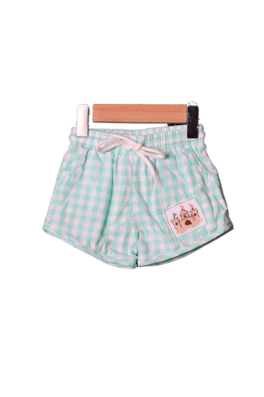 The Smocked Flamingo Smocked Sand Castle Gingham Swim Trunks